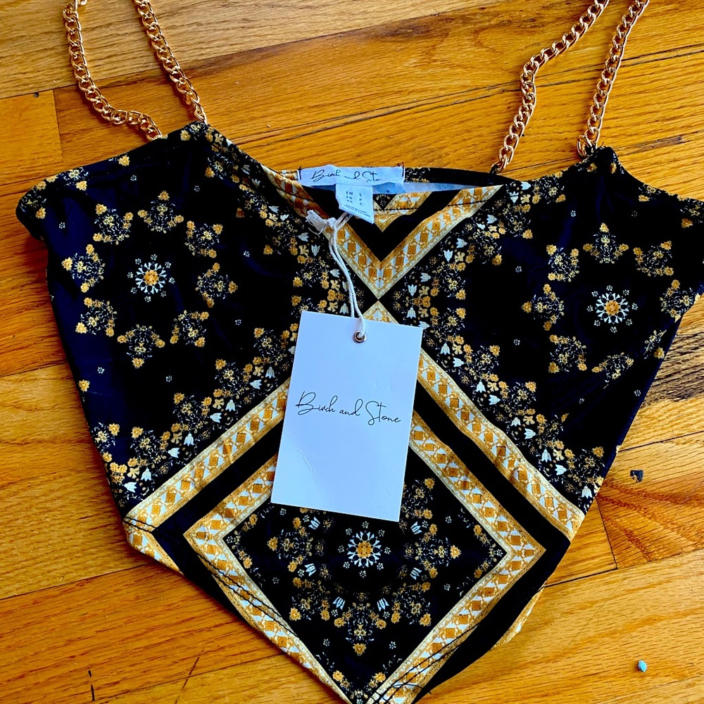 Brand new triangle Crop top, size small. Gold straps. Black and yellow design.